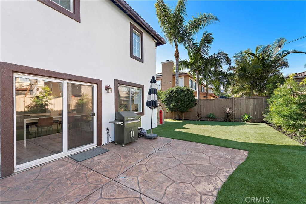 4314 Silver Spring Way Oceanside, CA 92057 - Photo 30 of 49 a house with yard and a garden