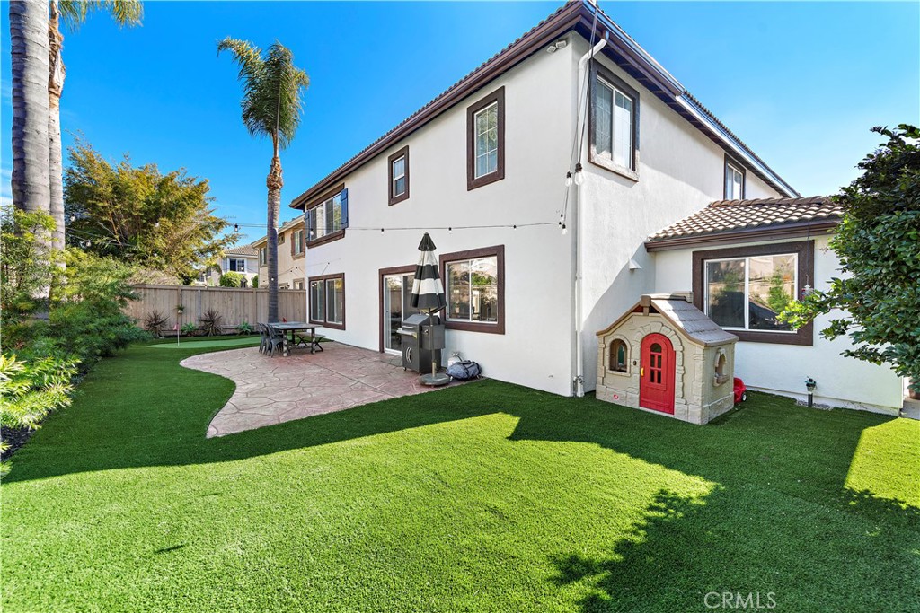 4314 Silver Spring Way Oceanside, CA 92057 - Photo 31 of 49 a front view of house with yard and green space