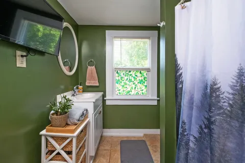 a room with furniture and a window