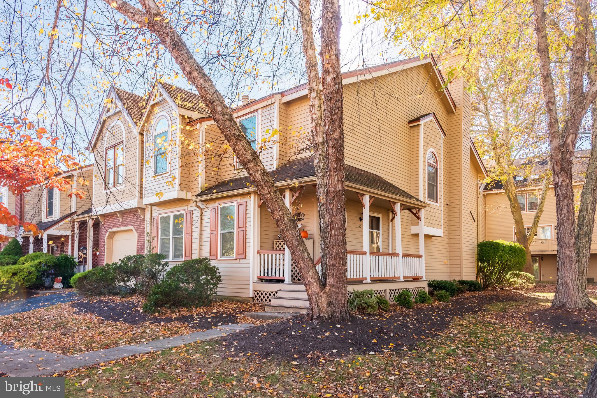 a view of a building with a yard