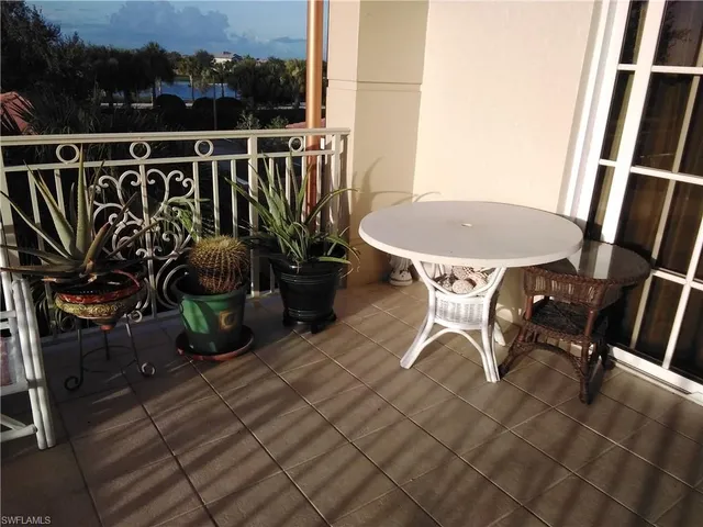 a view of a chairs and table on the terrace