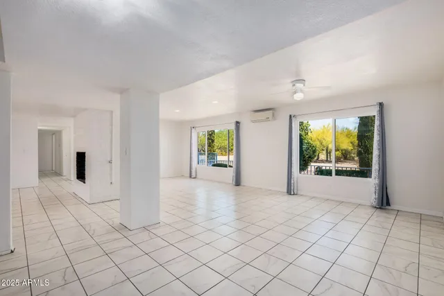 a view of an empty room and window