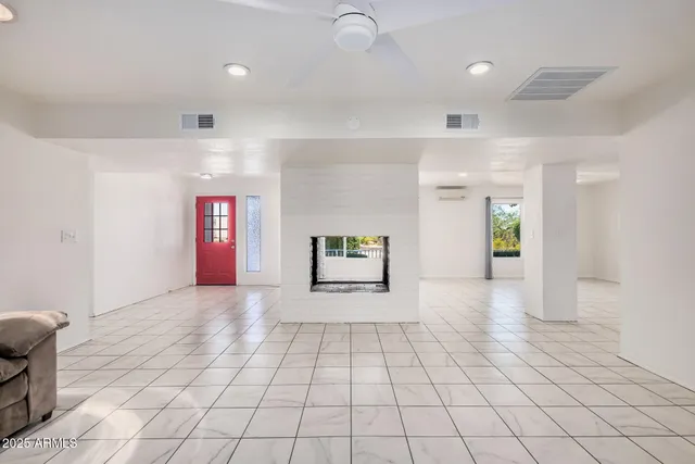 a living room with furniture and a couch
