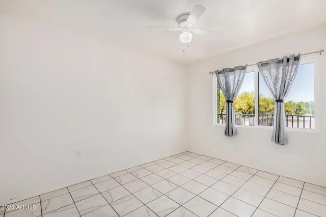 a view of an empty room with window