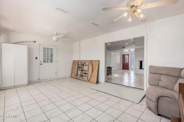 a view of a swimming pool with a patio