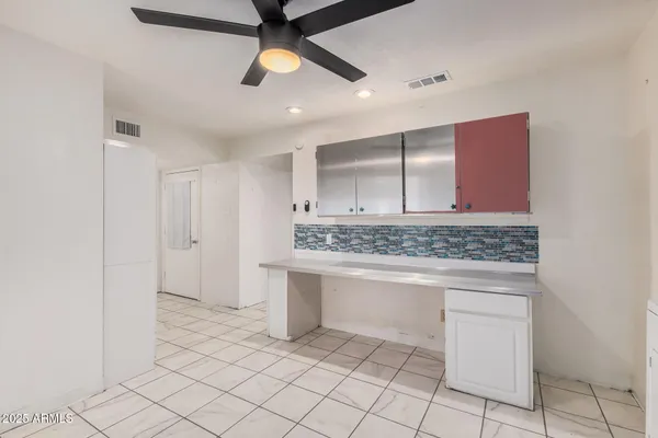 a view of a house with outdoor space and sitting area