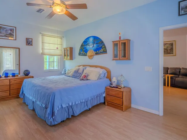 a patio with a table and chairs