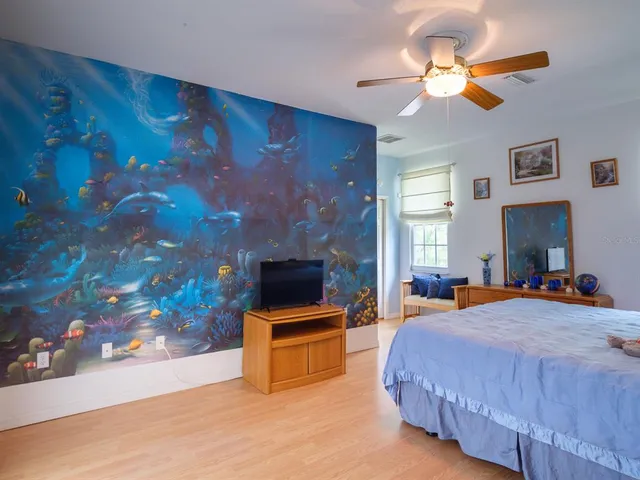 a view of a chair and table in the balcony