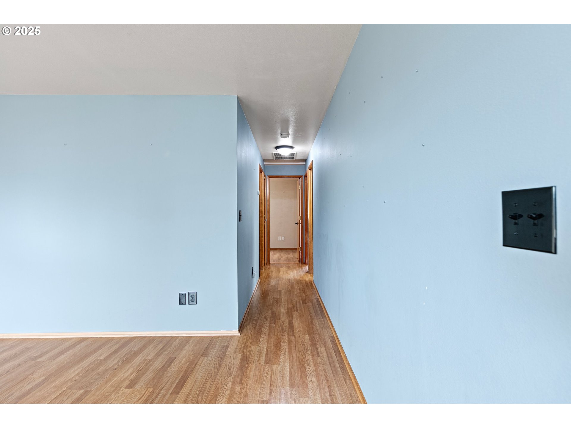 351 South 37th Place Springfield, OR 97478 - Photo 11 of 39 a view of a hallway with wooden floor