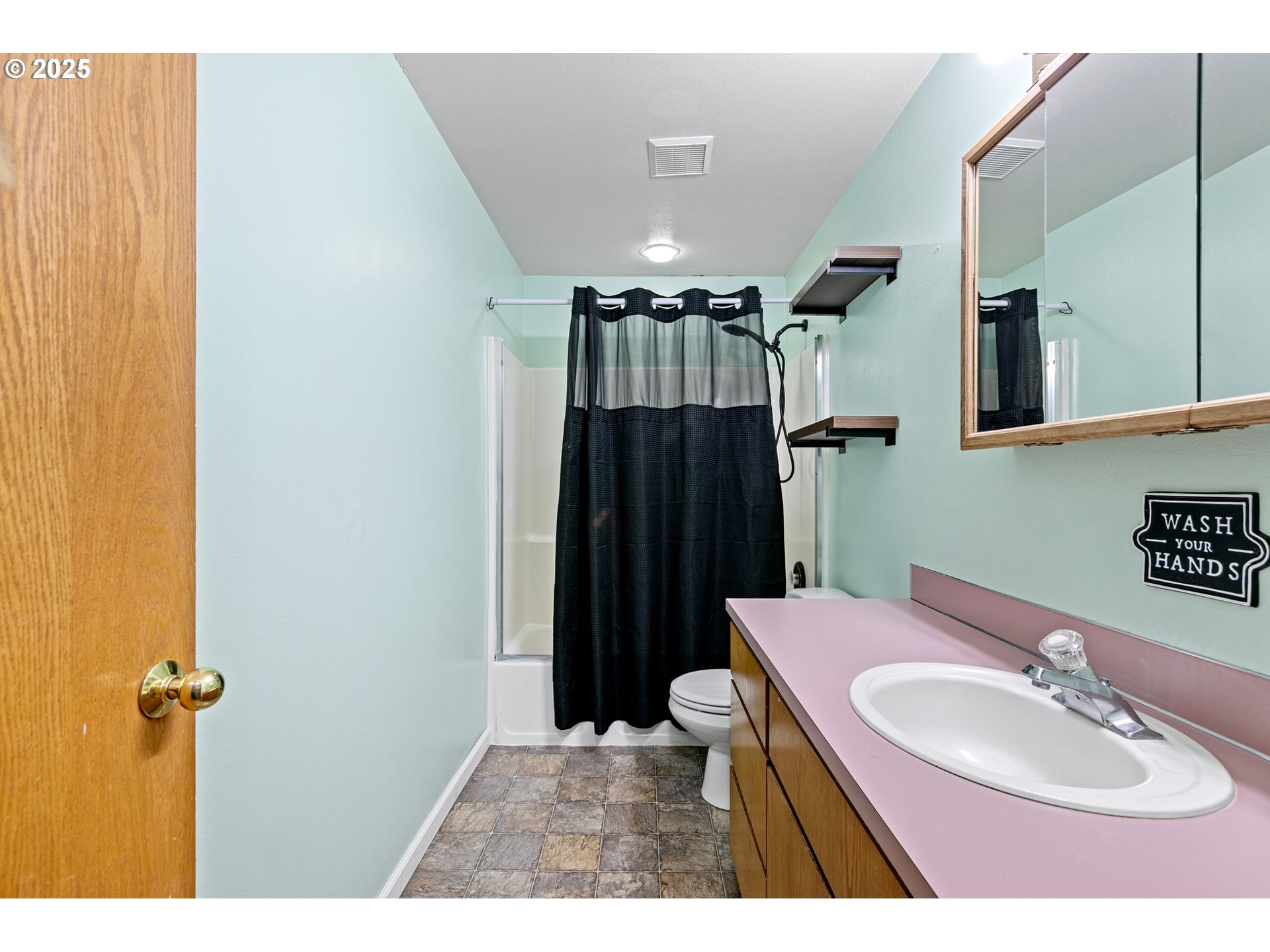 351 South 37th Place Springfield, OR 97478 - Photo 23 of 39 a bathroom with a sink toilet and shower