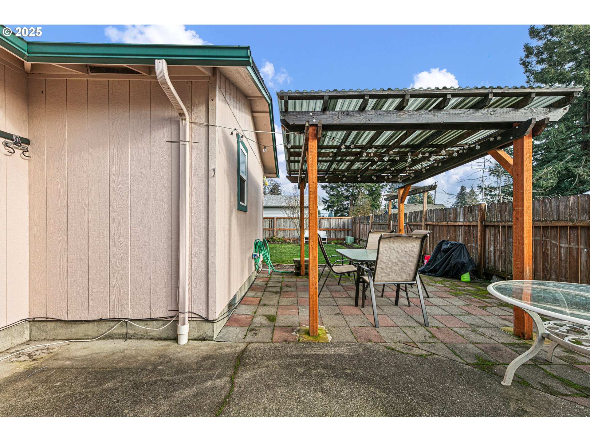 351 South 37th Place Springfield, OR 97478 - Photo 31 of 39 a patio with table and chairs