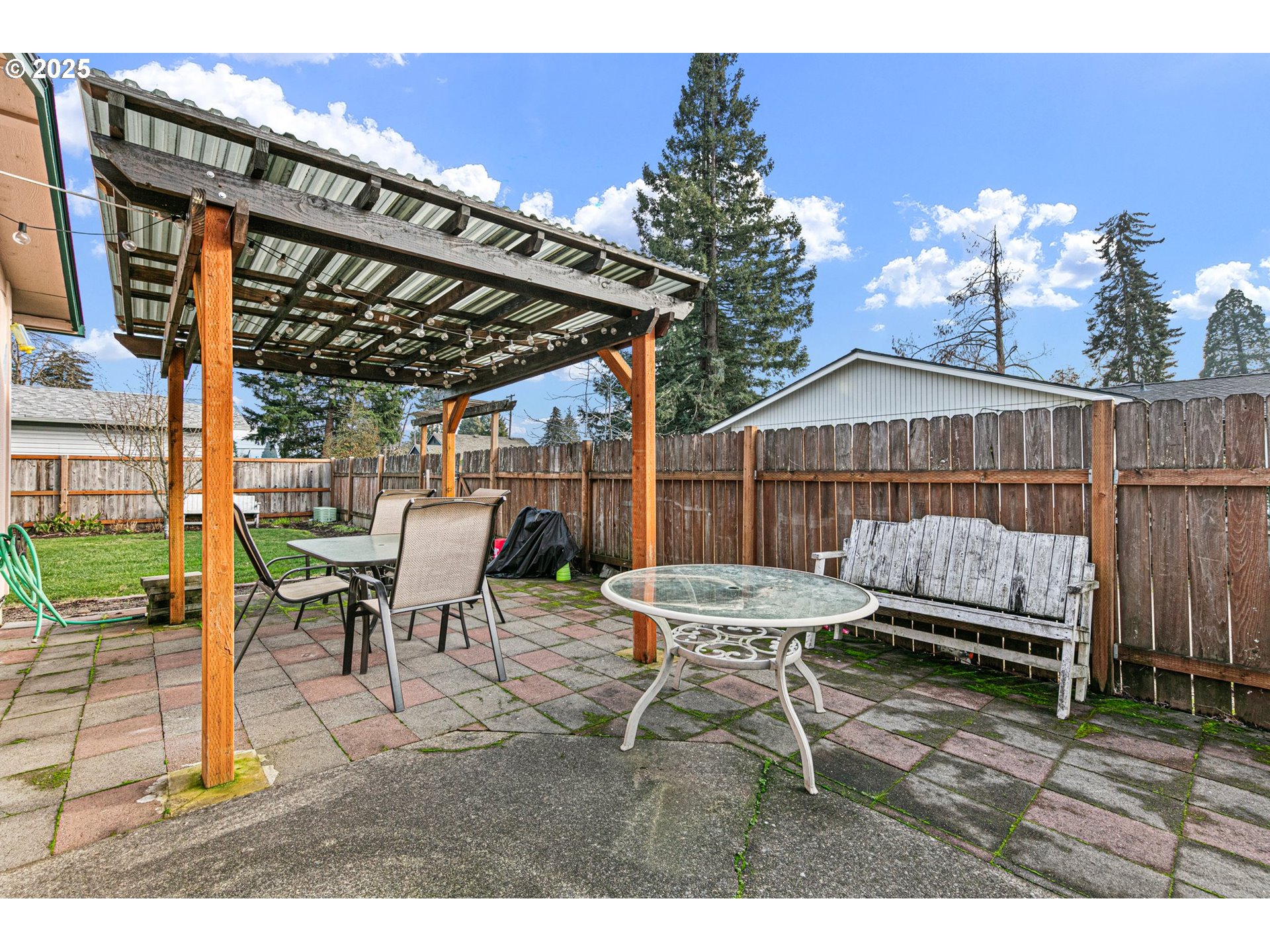 351 South 37th Place Springfield, OR 97478 - Photo 32 of 39 a view of a chairs and table in the patio