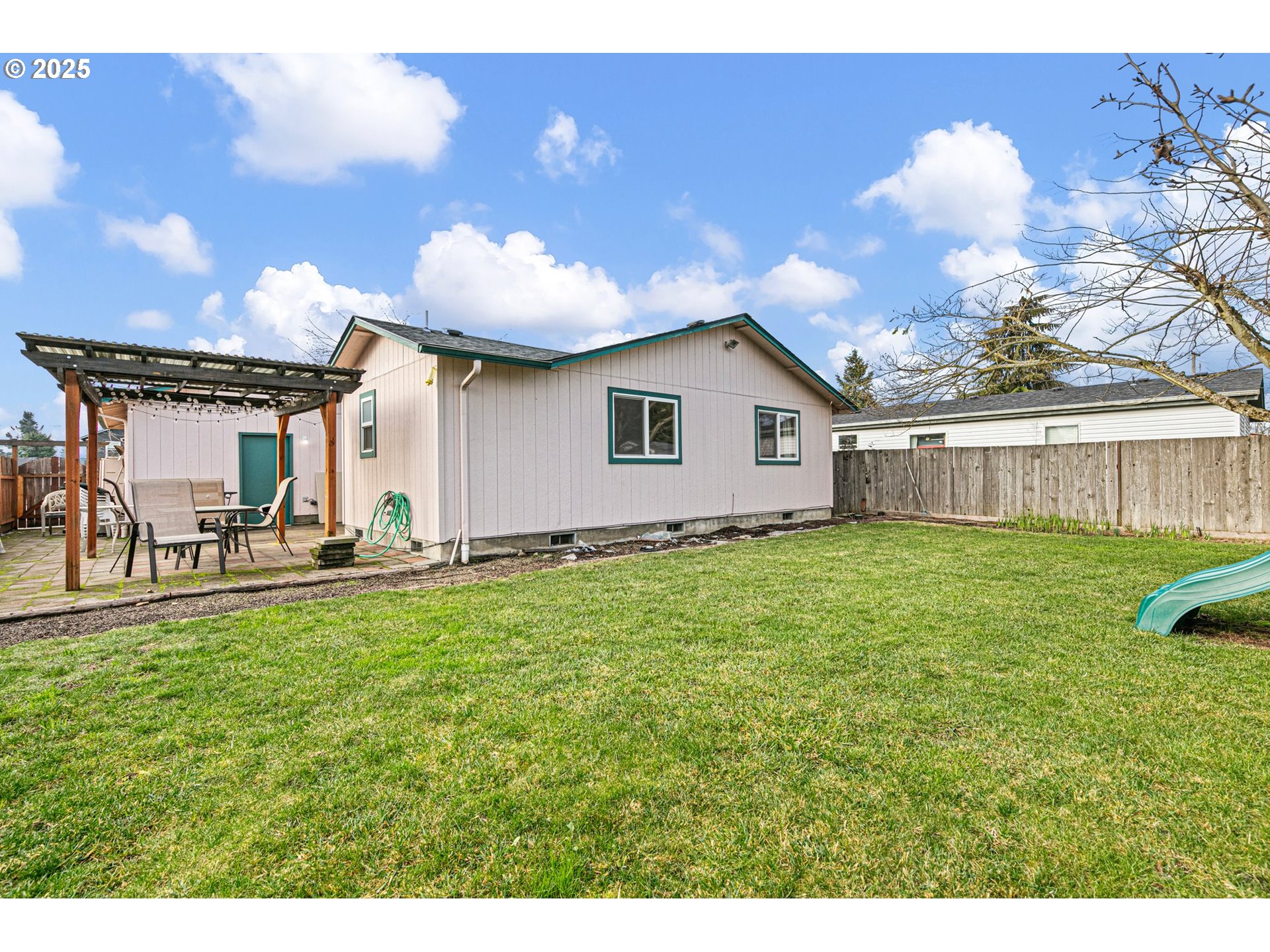 351 South 37th Place Springfield, OR 97478 - Photo 37 of 39 a view of a house with backyard