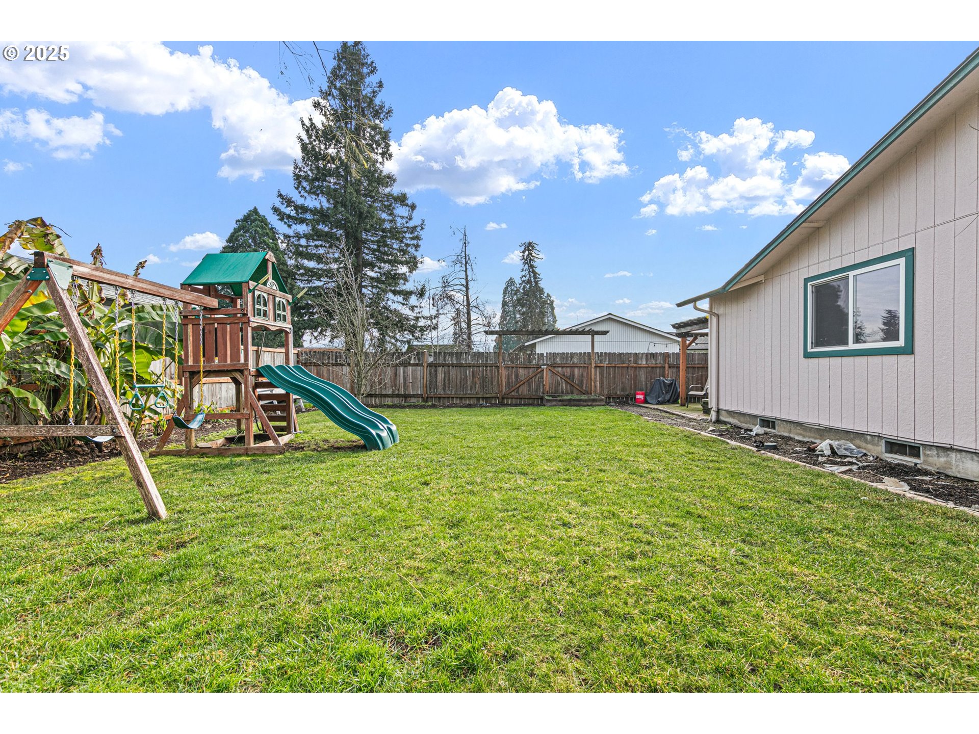 351 South 37th Place Springfield, OR 97478 - Photo 39 of 39 a view of a house with a backyard