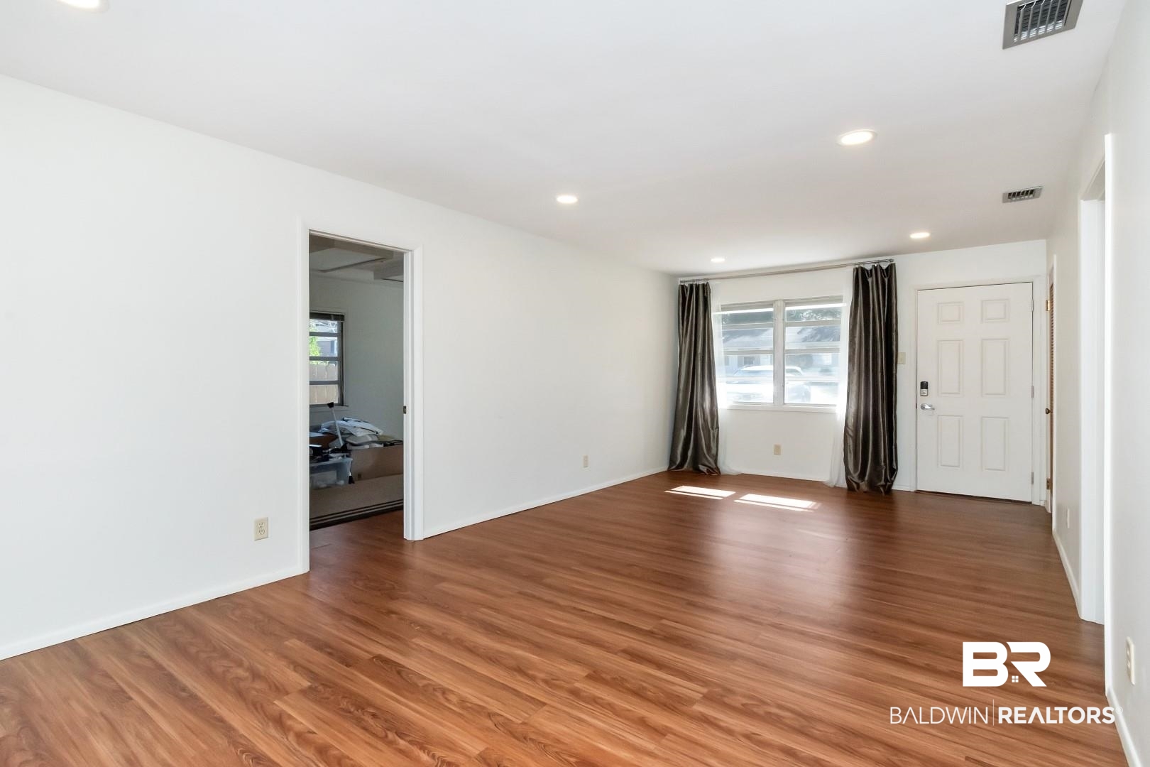5412 South Norden Drive Mobile, AL 36608 - Photo 14 of 38 Living Room featuring hardwood / wood-style flooring and a wealth of natural light