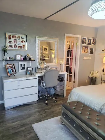 a bedroom with a bed and furniture