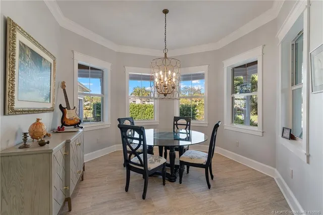 a kitchen with white cabinets and a stove