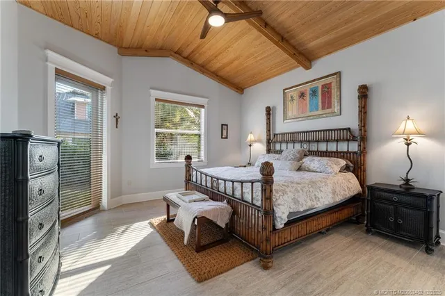 a view of a bedroom with washer and dryer