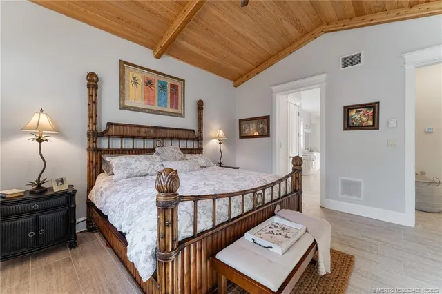 a view of walk in closet with clothes