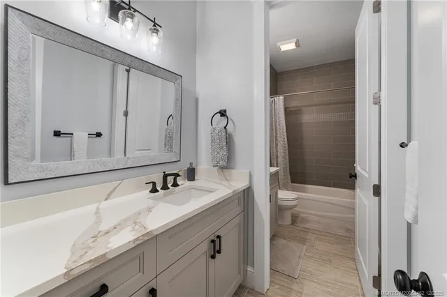 a view of a backyard with swimming pool