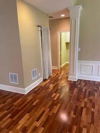 a view of entryway with wooden floor