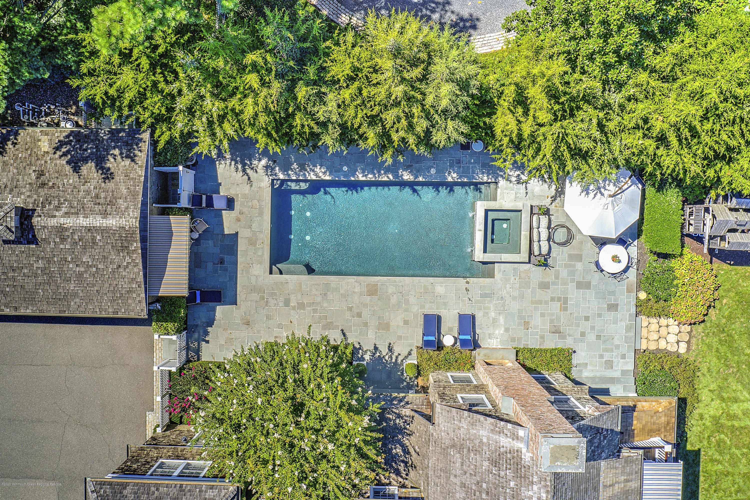 62 River Road Rumson, NJ 07760 - Photo 12 of 54 an aerial view of a house with a yard basket ball court and outdoor seating