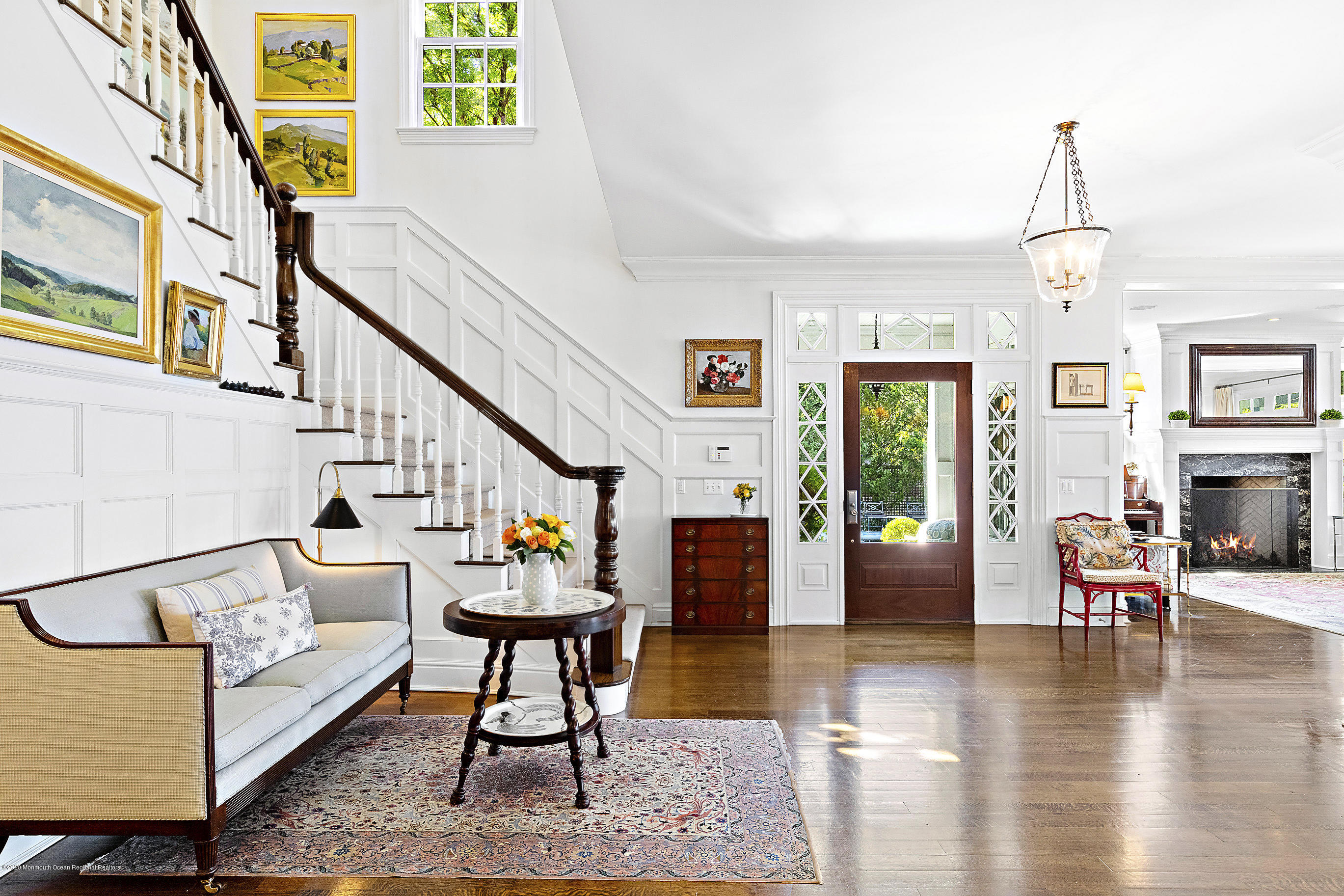 62 River Road Rumson, NJ 07760 - Photo 14 of 54 a living room with fireplace furniture and a wooden floor