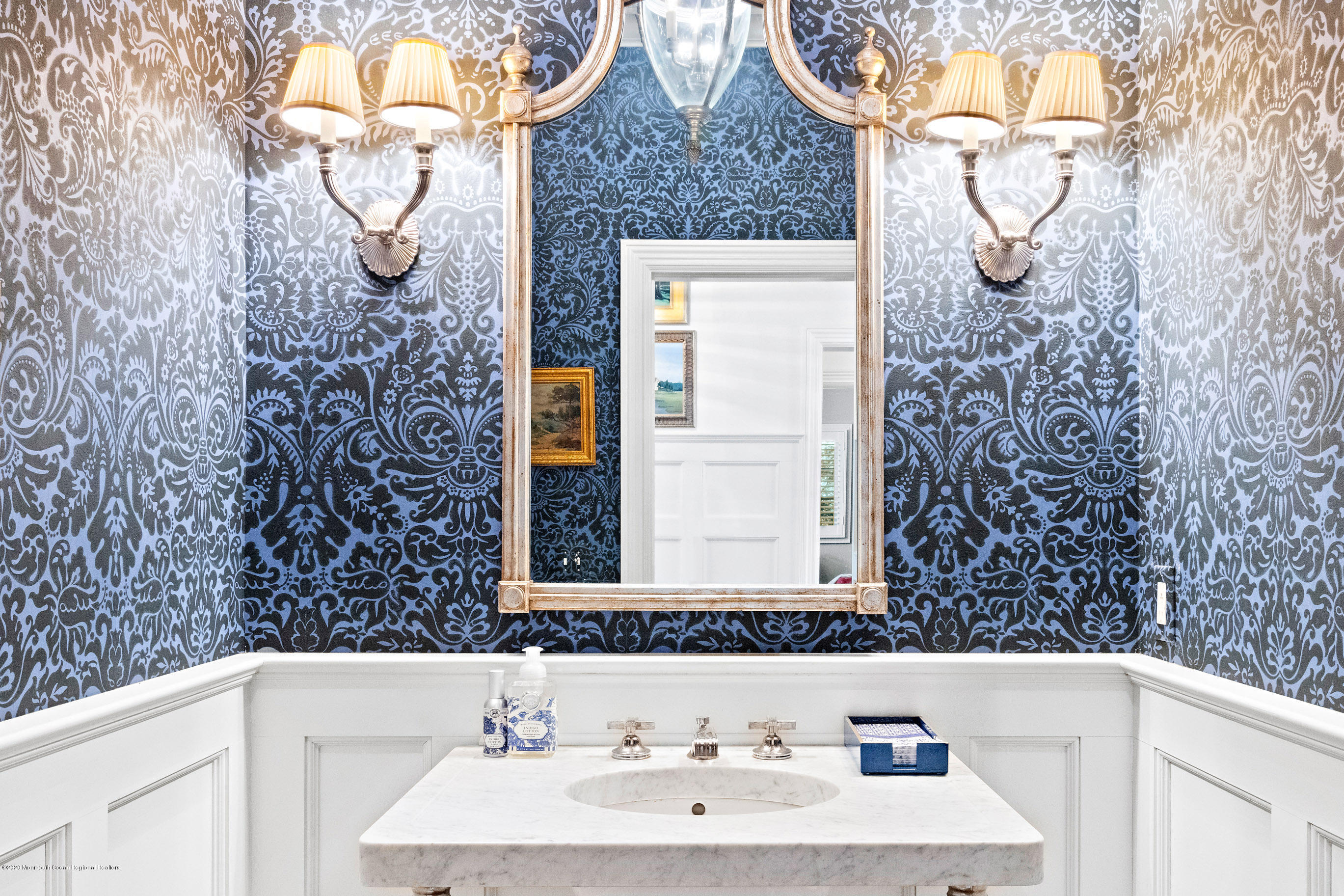 62 River Road Rumson, NJ 07760 - Photo 31 of 54 a bathroom with a sink and a mirror