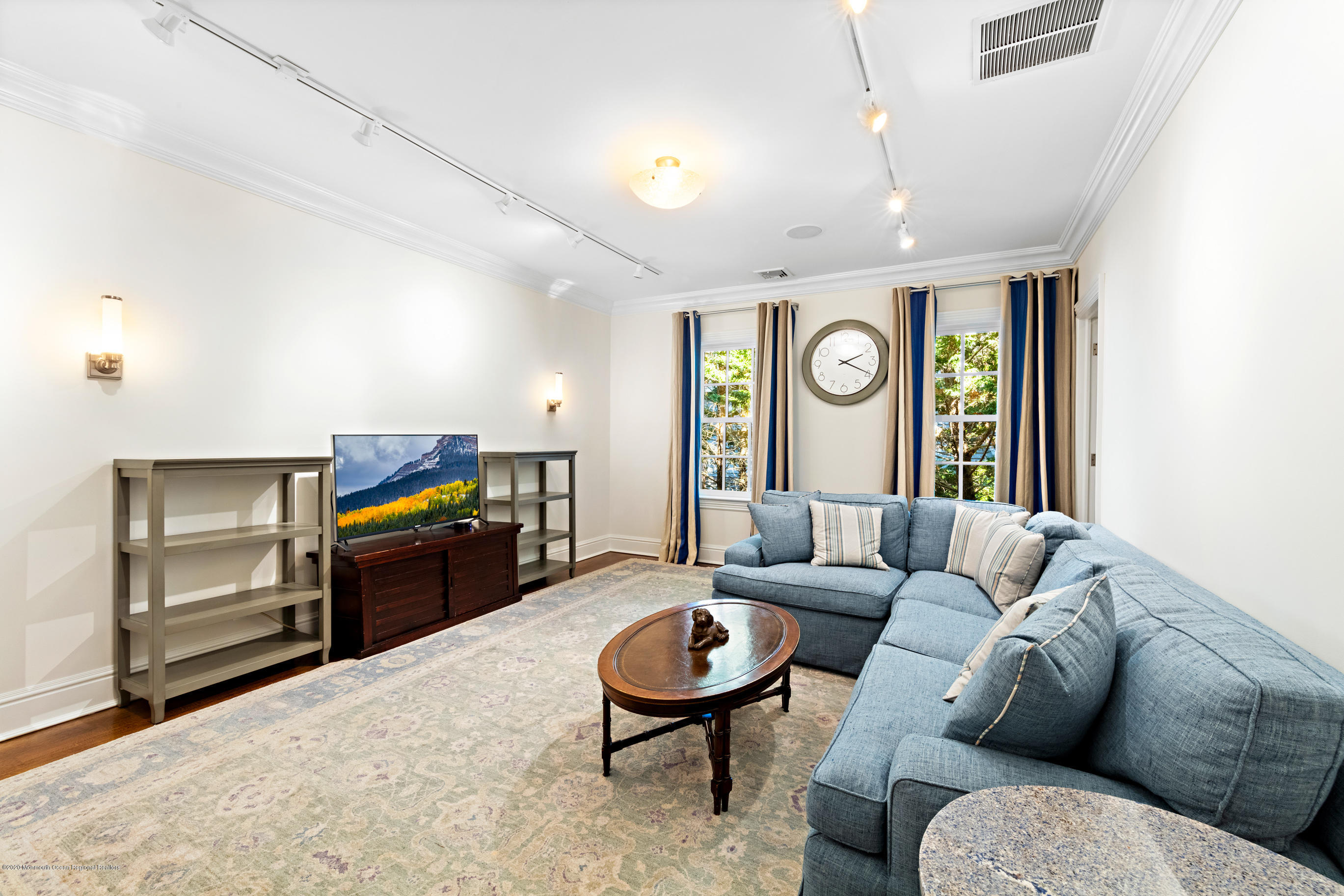 62 River Road Rumson, NJ 07760 - Photo 50 of 54 a living room with furniture and a large window