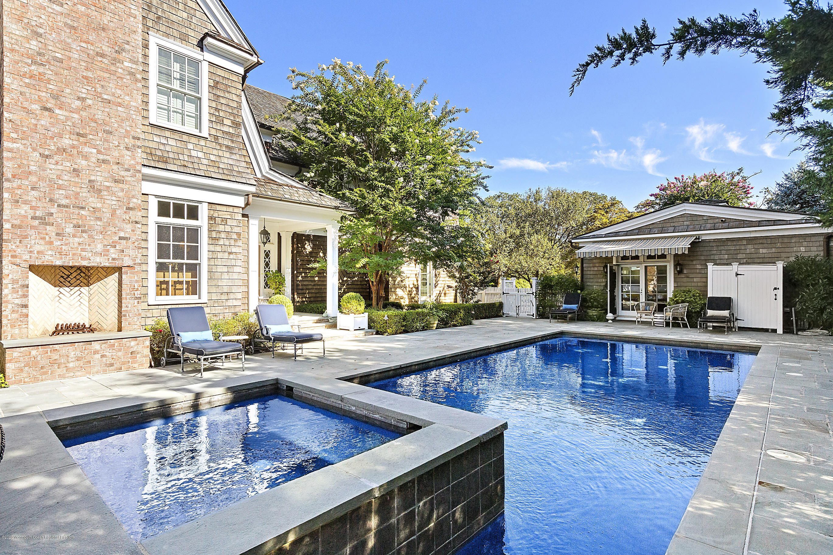 62 River Road Rumson, NJ 07760 - Photo 6 of 54 a view of a house with swimming pool and sitting area