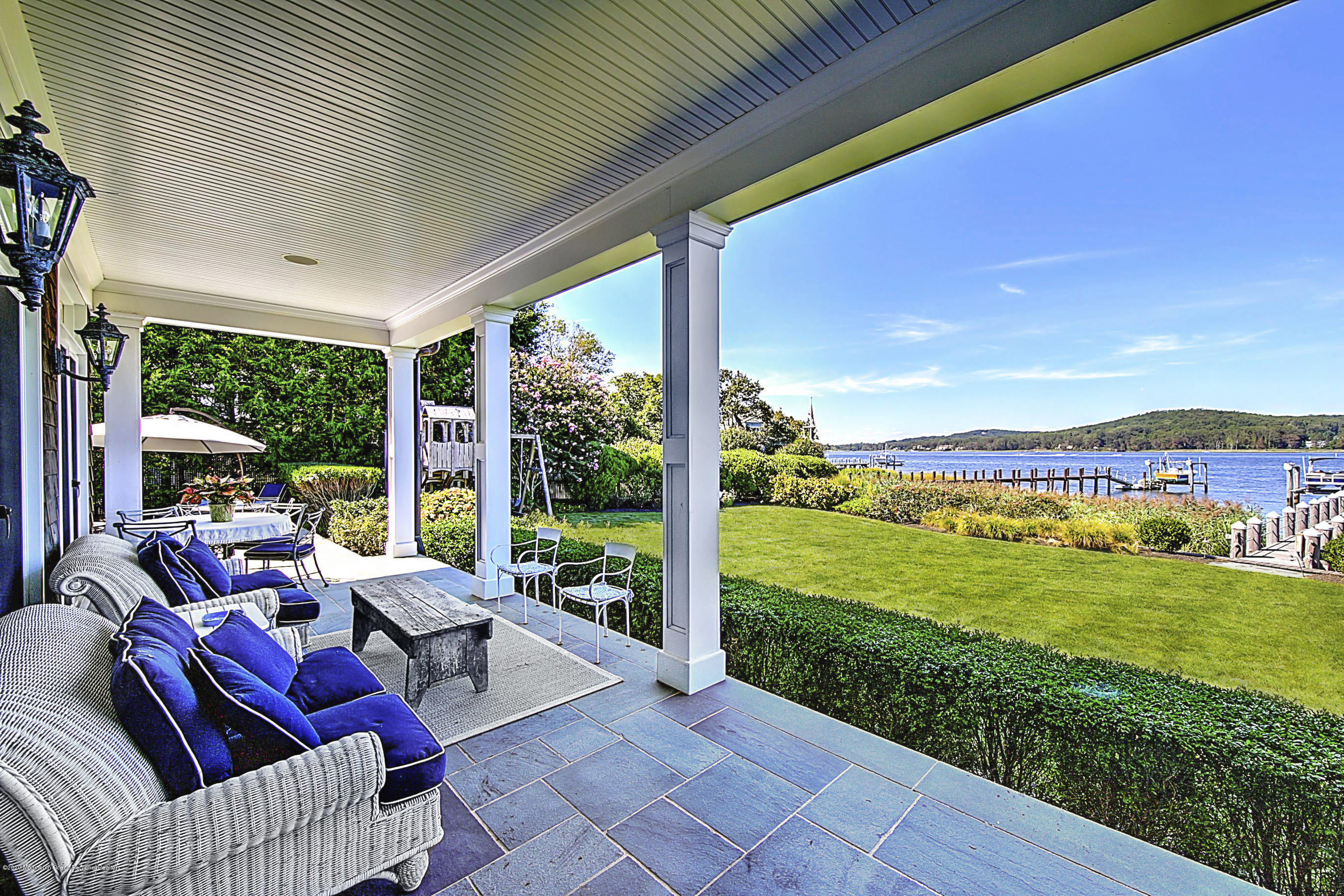 62 River Road Rumson, NJ 07760 - Photo 52 of 54 a balcony with furniture and garden view
