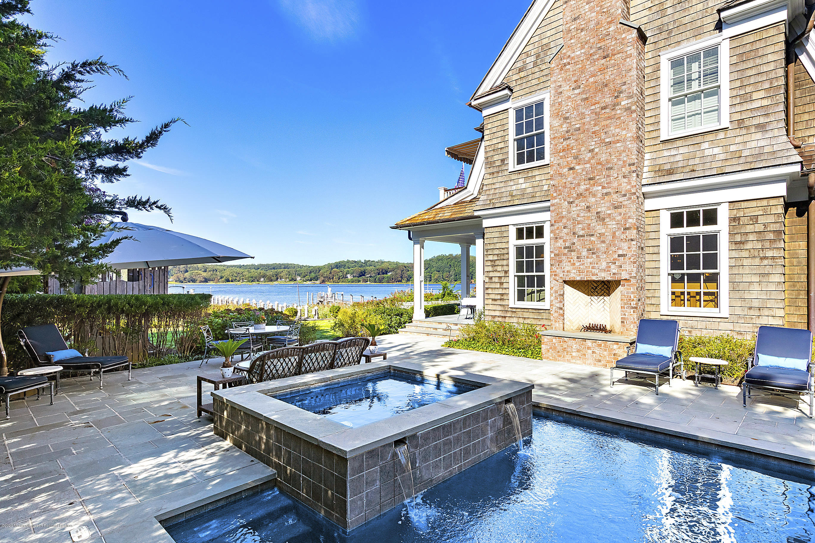 62 River Road Rumson, NJ 07760 - Photo 7 of 54 a view of swimming pool with lounge chair