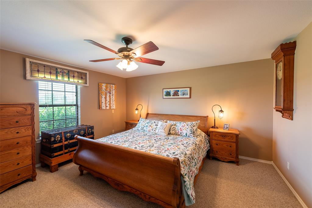 6888 Fm 2888 Naples, TX 75568 - Photo 14 of 40 a bedroom with a bed and a window