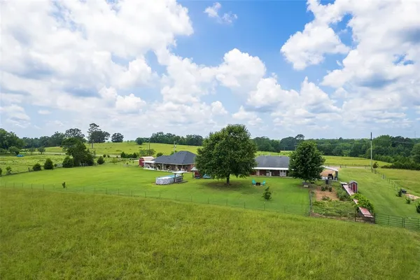 a view of a livingroom with furniture and wooden floor