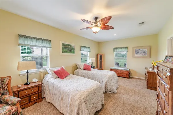a large kitchen with granite countertop a stove and a refrigerator
