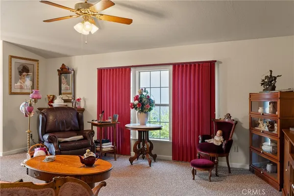 a room with furniture workspace and a window