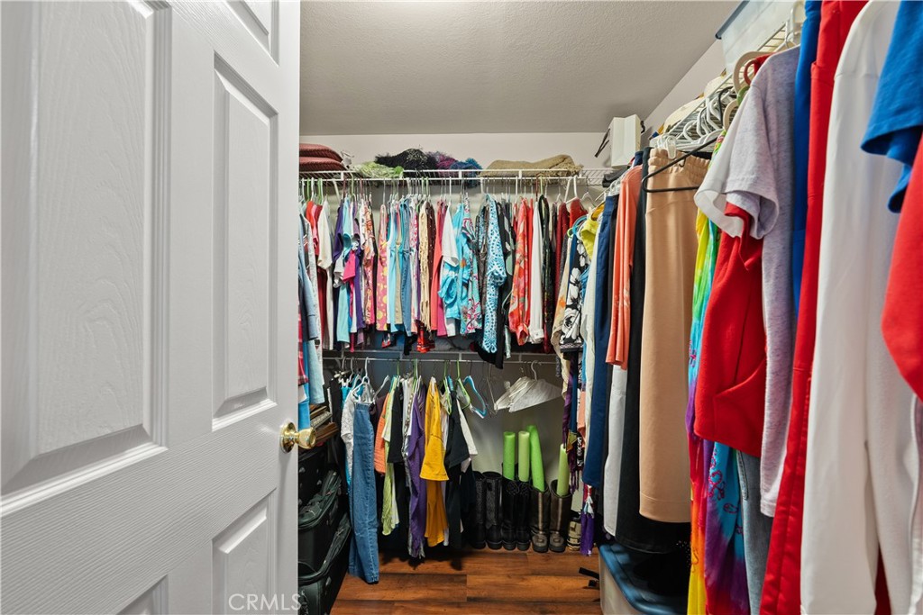 2050 Springfield Drive, Unit 215 Chico, CA 95928 - Photo 21 of 53 a view of walk in closet with clothes