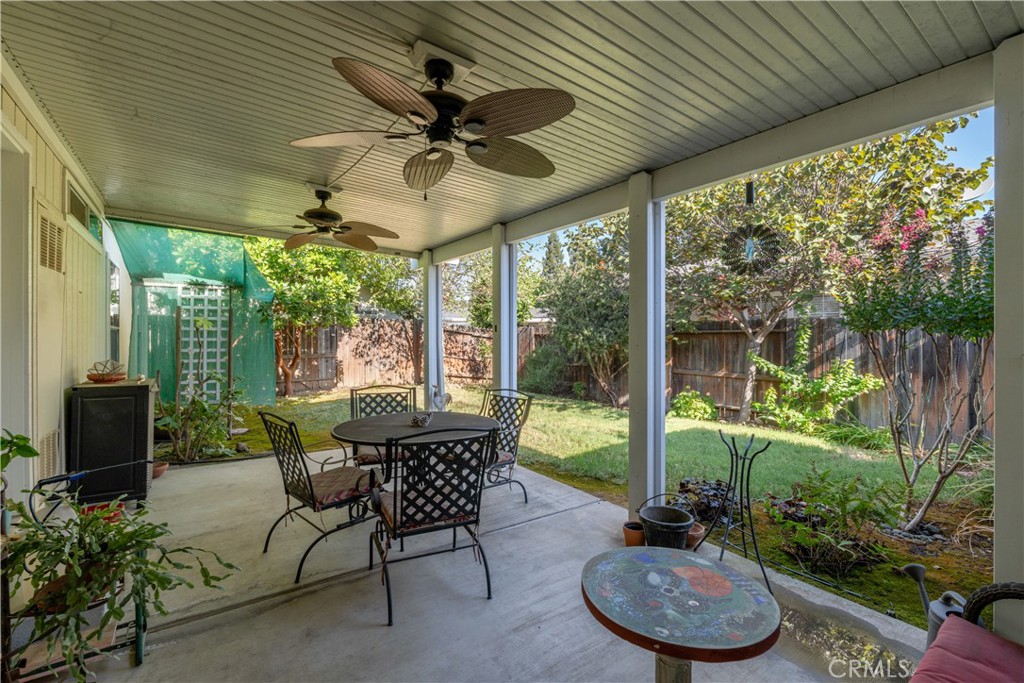 2050 Springfield Drive, Unit 215 Chico, CA 95928 - Photo 28 of 53 a view of a patio with a table chairs and a backyard
