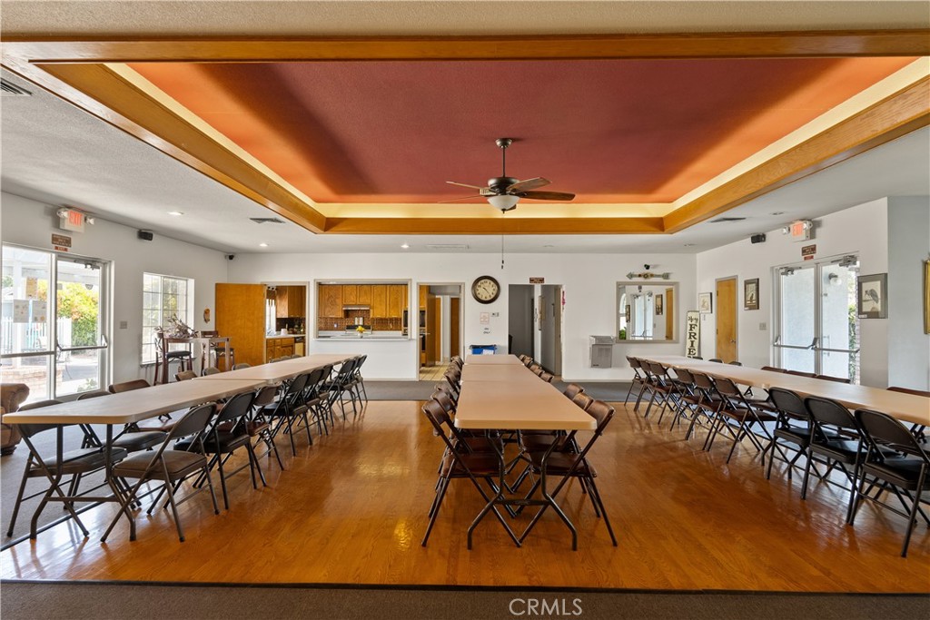 2050 Springfield Drive, Unit 215 Chico, CA 95928 - Photo 38 of 53 a dining hall with furniture and wooden floor