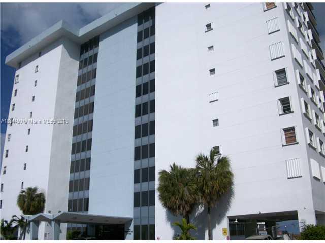 9273 Collins Avenue, Unit 503 Surfside, FL 33154 - Photo 2 of 14 front view of a tall building