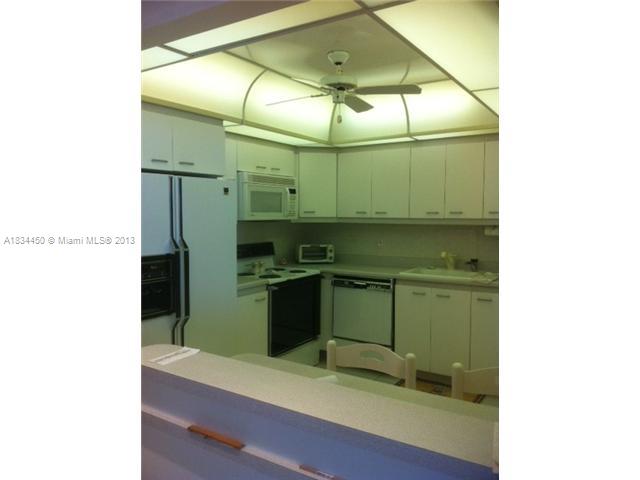 9273 Collins Avenue, Unit 503 Surfside, FL 33154 - Photo 8 of 14 a bathroom with a sink and a mirror