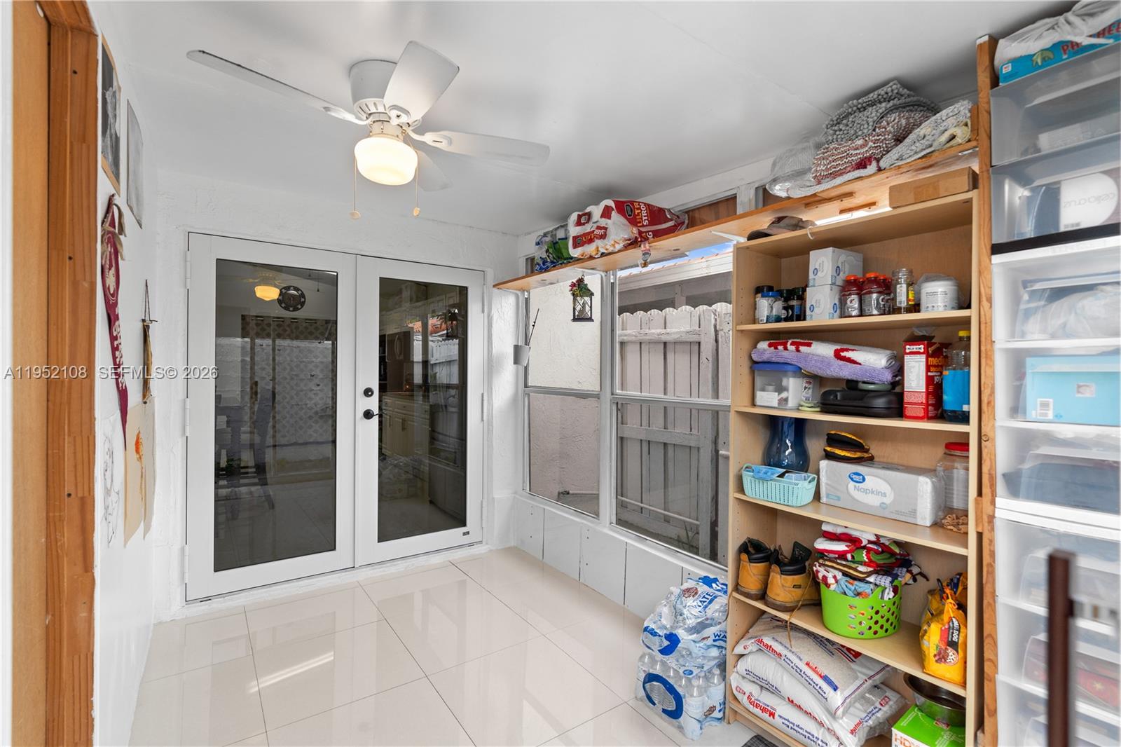 6919 West 29th Way Hialeah, FL 33018 - Photo 18 of 23 a view of store room with shelves