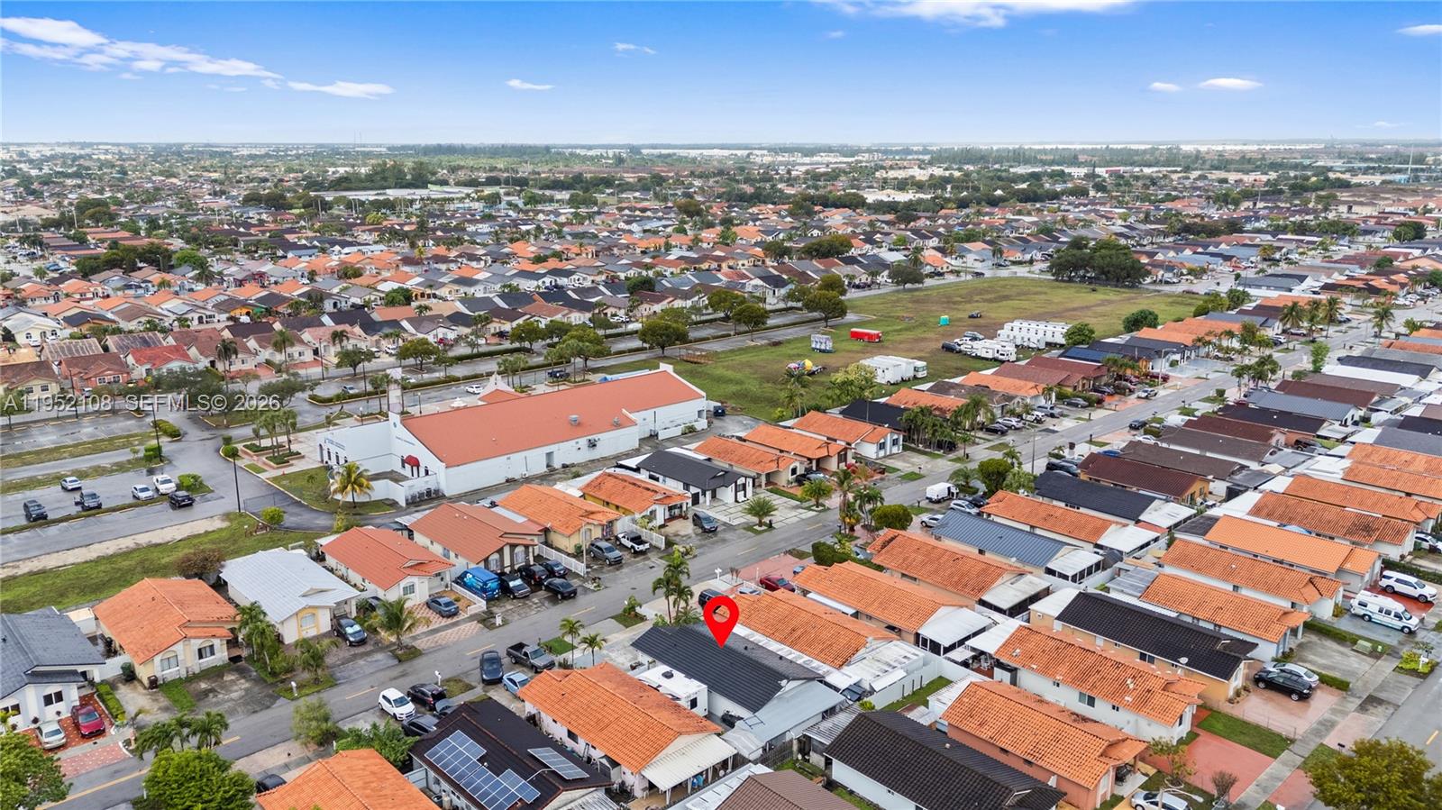 6919 West 29th Way Hialeah, FL 33018 - Photo 22 of 23 an aerial view of residential houses with outdoor space