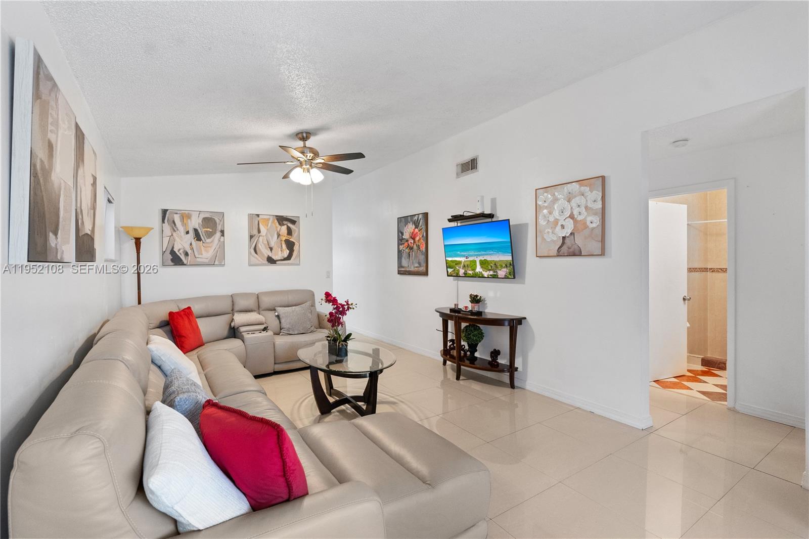 6919 West 29th Way Hialeah, FL 33018 - Photo 3 of 23 a living room with furniture