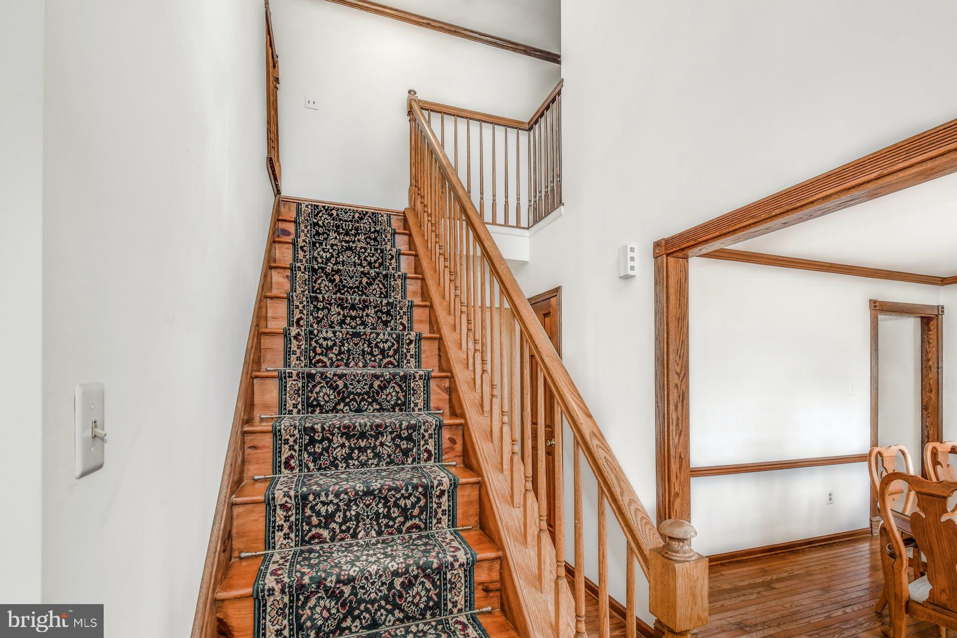 6013 German Road Pipersville, PA 18947 - Photo 5 of 30 Oak Staircase Adorns the 2 Story Foyer