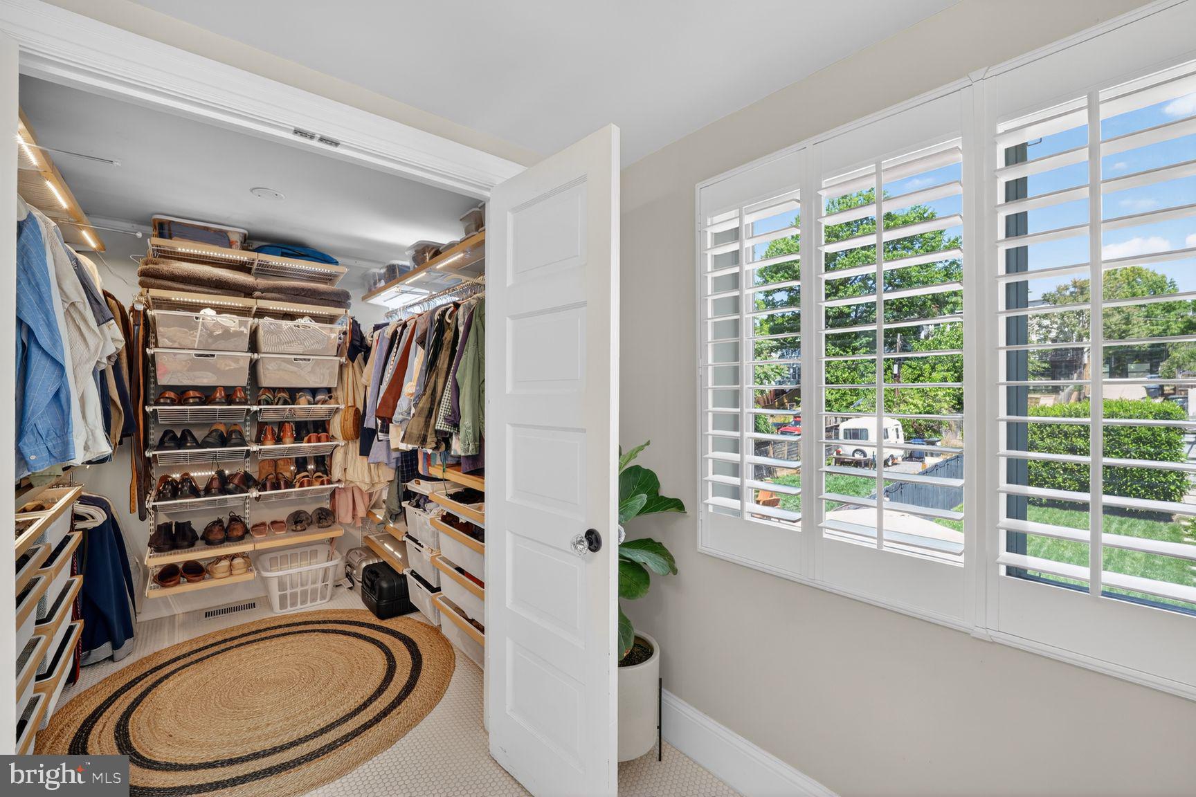 309 Webster Street Northwest Washington, DC 20011 - Photo 28 of 49 Stylish closet with organized elegance.