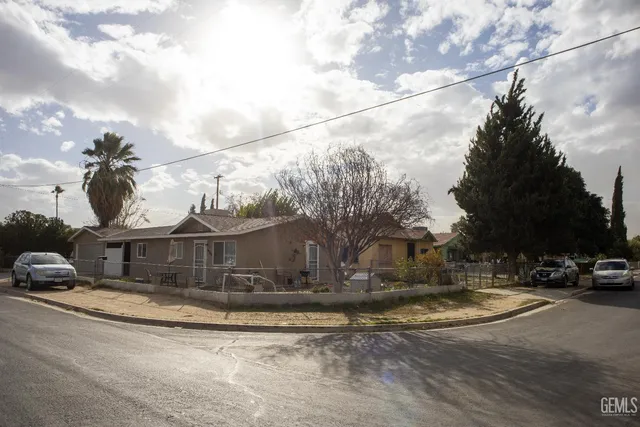 a view of a street with houses