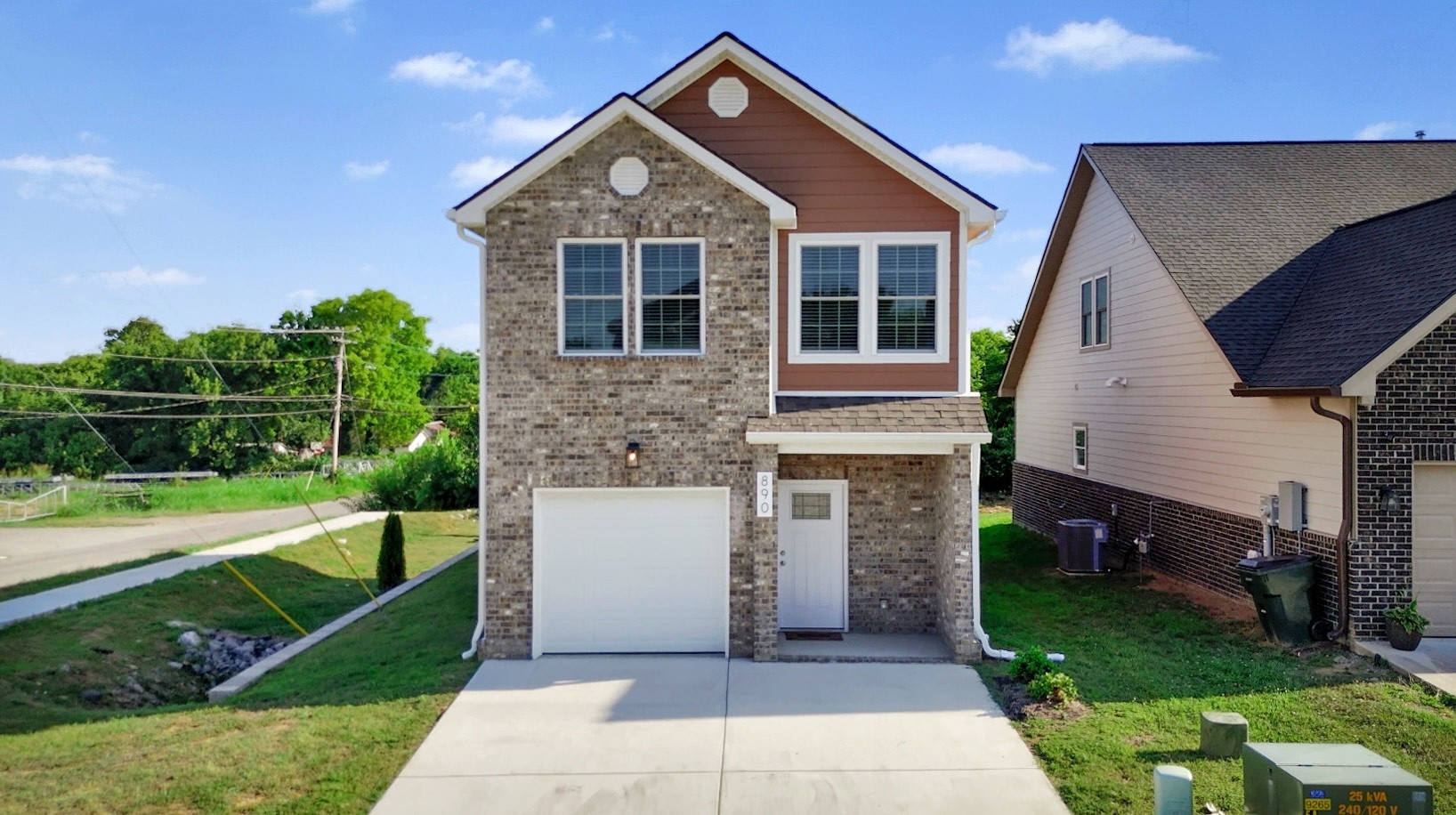 890 Blessing Way Gallatin, TN 37066 - Photo 18 of 19 a front view of a house with a yard