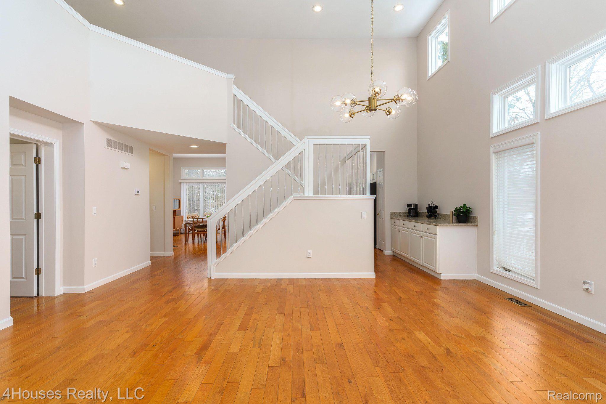 30658 Maplewood Circle Farmington, MI 48331 - Photo 16 of 50 Living Room - Stairway to 2nd Floor
