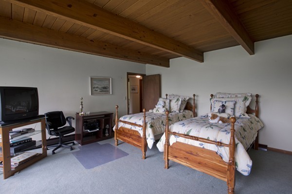666 Kennedy Road Northampton, MA 01053 - Photo 21 of 30 a view of a livingroom with furniture and a flat screen tv